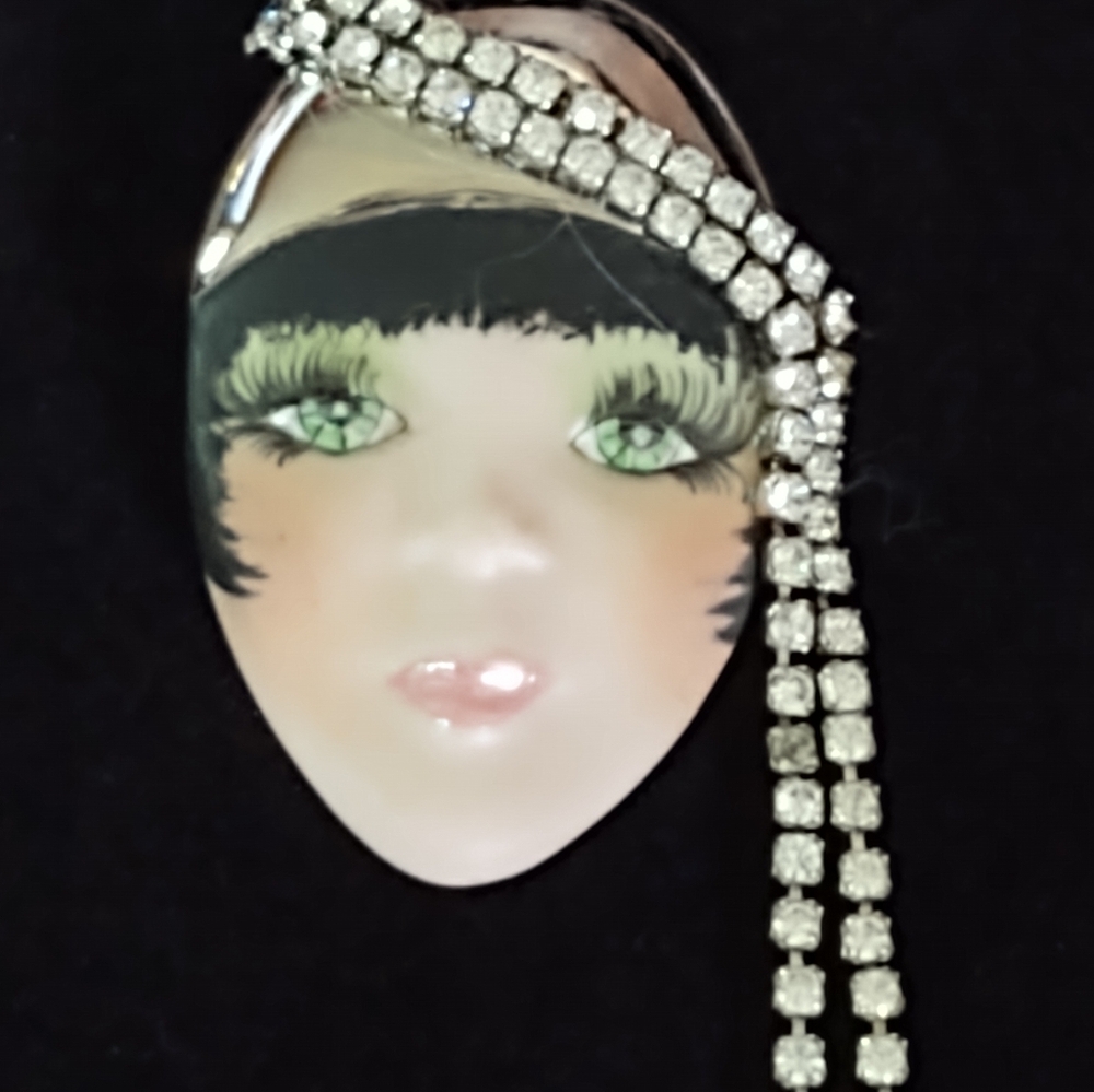 Elegant Silver and Cream Face Brooch Signed By Miray